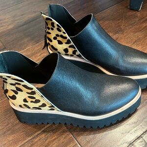 All Black brand zip-back booties